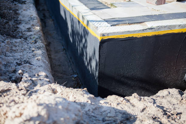 Professional Basement Waterproofing technician working in Pleasant Plain, OH